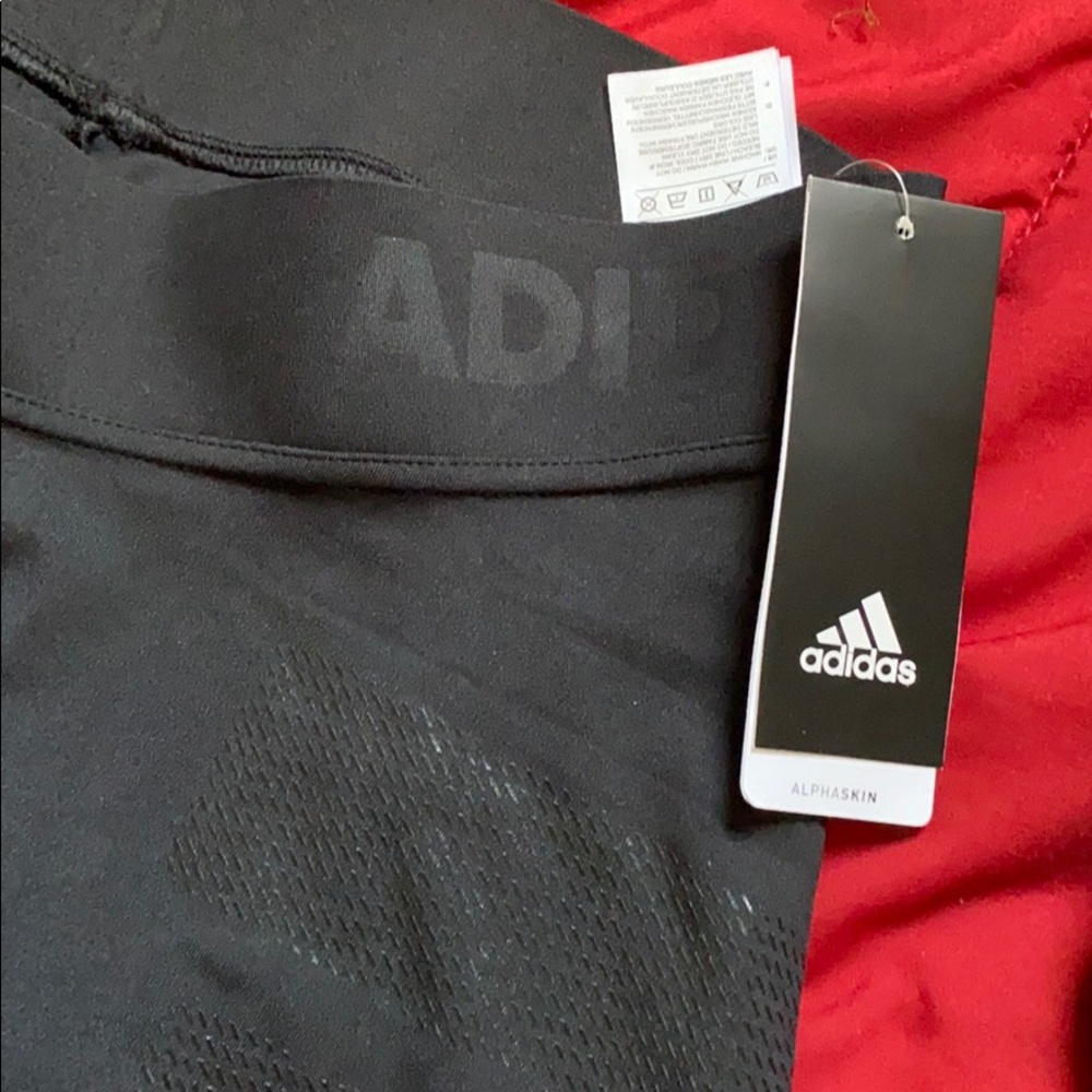 Never worn adidas men training pants